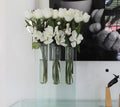 Triple bud vase with white tulips