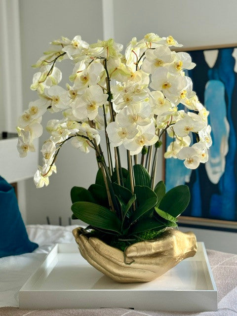 White Phalaenopsis Orchids in Gold Open Hands Sculpture Vase